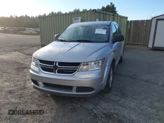 2013 Dodge Journey American Value with VIN 3C4PDCAB3DT610374, listed as a IAAI auction lot 40899147 with 133,386 mi miles and . Bid and sale history available at DreamBid. Image 2.