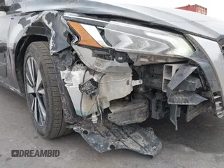 2019 Nissan Altima 2.5 SL with VIN 1N4BL4EV6KC165666, listed as a IAAI auction lot 41793064 with 171,927 mi miles. Bid and sale history available at carsss.com. Image 20.