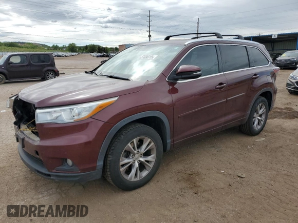 2015 Toyota Highlander XLE z VIN 5TDKKRFH0FS097839, wystawiony jako Copart lot #57030755 z przebiegiem 105 997 mil mil oraz Szkoda całkowita • Salvage title. Historia ofert i sprzedaży dostępna na DreamBid. Obrazek 1.