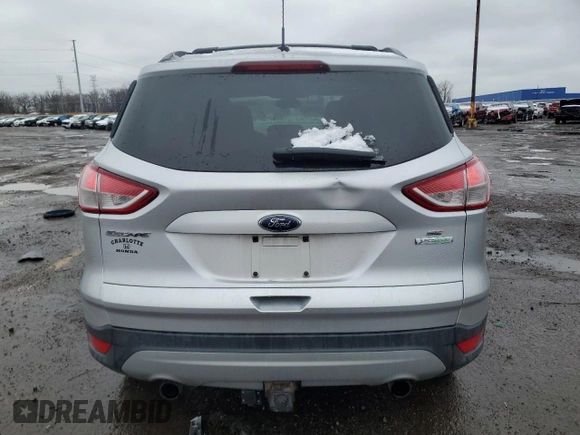 2013 Ford Escape SE with VIN 1FMCU0G99DUC31835, listed as a Copart auction lot 52690935 with 98,680 mi miles and Clean Title. Bid and sale history available at carsss.com. Image 6.