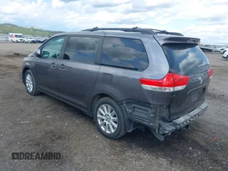 2012 Toyota Sienna LE with VIN 5TDJK3DC3CS037713, listed as a IAAI auction lot 42703815 with 208,000 mi miles and . Bid and sale history available at DreamBid. Image 3.