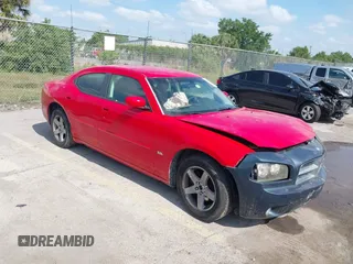2010 Dodge Charger SXT with VIN 2B3CA3CV7AH302306, listed as a IAAI auction lot 42105542 with 83,313 mi miles and . Bid and sale history available at carsss.com. Image 1.