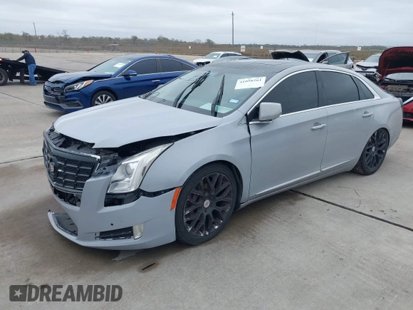 2013 Cadillac XTS Luxury with VIN 2G61P5S38D9213426, listed as a IAAI auction lot 41098261 with Not Provided miles. Bid and sale history available at carsss.com. Image 2.