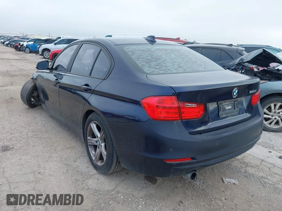 2015 BMW 3 Series 320i with VIN WBA3B1C53FK138310, listed as a IAAI auction lot 41677208 with 57,891 mi miles. Bid and sale history available at carsss.com. Image 3.