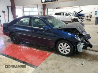 2004 Toyota Camry LE with VIN 4T1BF32K64U072368, listed as a Copart auction lot 51821965 with 136,646 mi miles and Salvage Title. Bid and sale history available at DreamBid. Image 4.