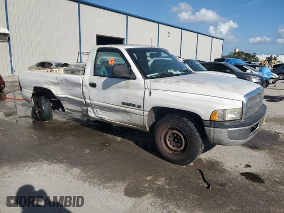 2001 Dodge Ram 2500 with VIN 3B7KC26Z51M258207, listed as a Copart auction lot 79915184 with 323,159 mi miles and Salvage Title. Bid and sale history available at carsss.com. Image 4.