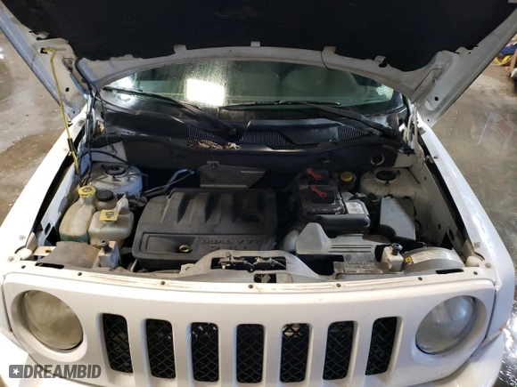 2011 Jeep Patriot Sport with VIN 1J4NF1GB6BD216474, listed as a Copart auction lot 38417154 with 129,163 mi miles and Salvage Title. Bid and sale history available at carsss.com. Image 11.
