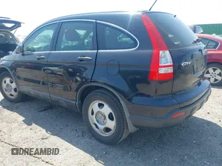2007 Honda CR-V LX with VIN 5J6RE38377L000654, listed as a IAAI auction lot 42031455 with 112,869 mi miles. Bid and sale history available at carsss.com. Image 3.