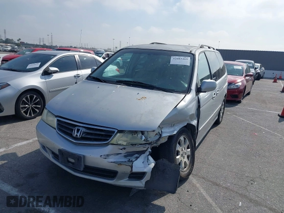 2004 Honda Odyssey EX with VIN 5FNRL18684B143038, listed as a IAAI auction lot 42083469 with 160,317 mi miles and . Bid and sale history available at DreamBid. Image 2.