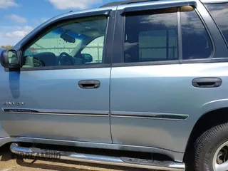 2006 GMC Envoy SLE with VIN 1GKDS13S362310613, listed as a IAAI auction lot 41881880 with 202,893 mi miles. Bid and sale history available at carsss.com. Image 14.