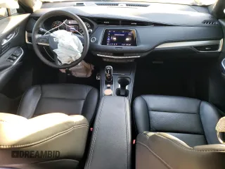 2020 Cadillac XT4 FWD Premium Luxury z VIN 1GYFZCR44LF056476, wystawiony jako Copart lot #43559495 z przebiegiem 51 076 mil mil oraz Szkody całkowita. Historia ofert i sprzedaży dostępna na DreamBid. Obrazek 8.