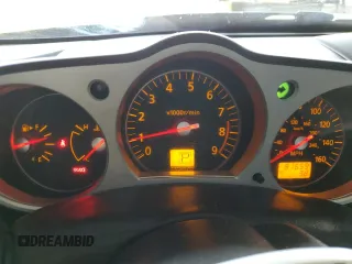 2008 Nissan 350Z Touring z VIN JN1BZ34D28M704964, wystawiony jako Copart lot #82338054 z przebiegiem 81 659 mil mil oraz Szkoda całkowita • Salvage title. Historia ofert i sprzedaży dostępna na DreamBid. Obrazek 9.