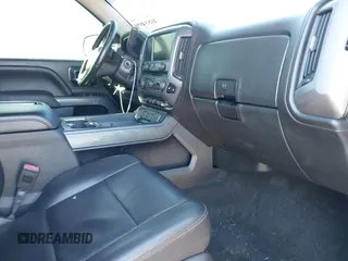 2014 GMC Sierra 1500 SLT with VIN 3GTU2VEC0EG208569, listed as a IAAI auction lot 41834893 with 128,731 mi miles and . Bid and sale history available at DreamBid. Image 5.