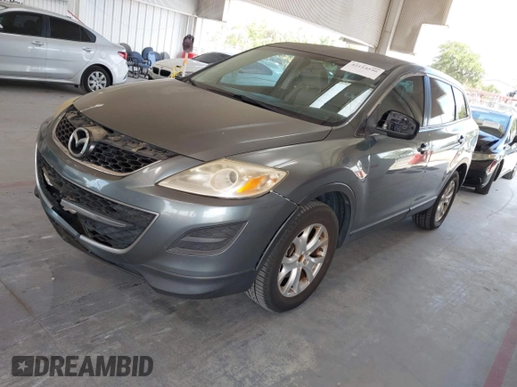 2011 Mazda CX-9 Touring with VIN JM3TB2CA8B0318305, listed as a IAAI auction lot 42114546 with 207,895 mi miles and . Bid and sale history available at DreamBid. Image 2.