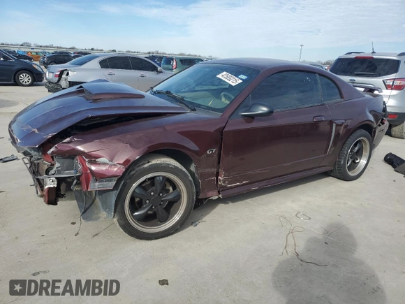 2003 Ford Mustang GT Deluxe with VIN 1FAFP42XX3F305326, listed as a Copart auction lot 42689215 with 0 mi miles and Salvage Title. Bid and sale history available at carsss.com. Image 1.