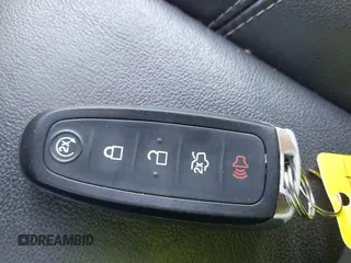2018 Ford Escape Titanium with VIN 1FMCU0J99JUB09562, listed as a IAAI auction lot 41547659 with 63,700 mi miles and . Bid and sale history available at DreamBid. Image 11.