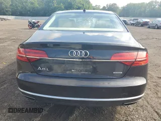2015 Audi A8 3.0T z VIN WAU3GAFD6FN036423, wystawiony jako Copart lot #60436925 z przebiegiem 161 677 mil mil oraz Szkoda całkowita • Salvage title. Historia ofert i sprzedaży dostępna na DreamBid. Obrazek 6.