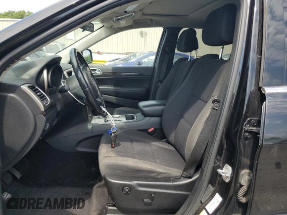 2011 Jeep Grand Cherokee Laredo with VIN 1J4RR4GG5BC572376, listed as a Copart auction lot 63388535 with 135,995 mi miles and Clean title. Bid and sale history available at DreamBid. Image 7.