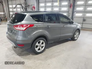 2014 Ford Escape SE with VIN 1FMCU9G99EUC45854, listed as a IAAI auction lot 41986959 with 124,591 mi miles. Bid and sale history available at carsss.com. Image 4.