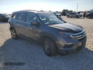 2018 Honda Pilot EX-L с VIN 5FNYF5H6XJB008231, выставлен на аукционе Copart как лот 70389974 с пробегом Не указан миль и Списание • Salvage title. История ставок и продаж доступна на DreamBid. Изображение 4.