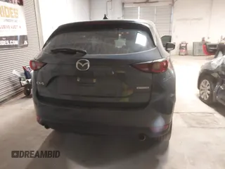 2021 Mazda CX-5 Touring with VIN JM3KFACM9M0379508, listed as a IAAI auction lot 41577251 with 46,519 mi miles. Bid and sale history available at carsss.com. Image 16.