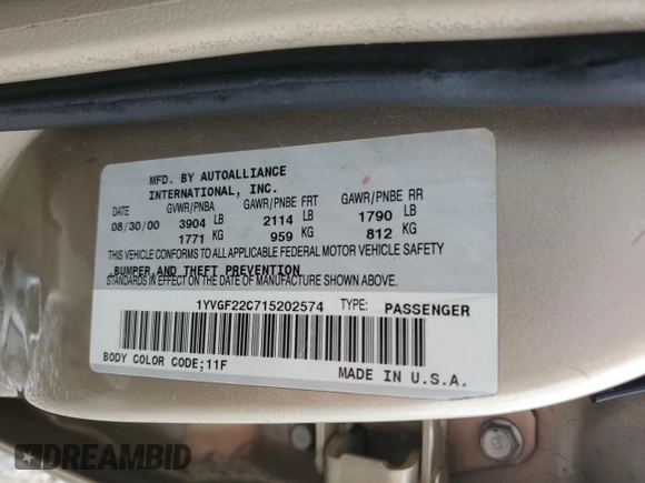 2001 Mazda 626 LX z VIN 1YVGF22C715202574, wystawiony jako Copart lot #54132915 z przebiegiem 237 041 mil mil oraz Szkoda całkowita • Salvage title. Historia ofert i sprzedaży dostępna na DreamBid. Obrazek 13.