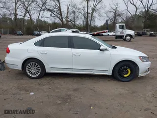 2016 Volkswagen Passat 1.8T SE w/Technology with VIN 1VWBS7A30GC013454, listed as a IAAI auction lot 41477109 with 134,027 mi miles. Bid and sale history available at carsss.com. Image 14.