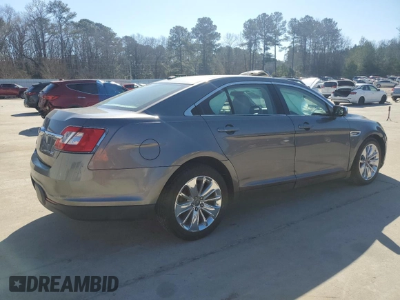 2011 Ford Taurus Limited с VIN 1FAHP2JW5BG132894, выставлен на аукционе Copart как лот 46996815 с пробегом 76 980 миль миль и Списание • Salvage title. История ставок и продаж доступна на DreamBid. Изображение 3.