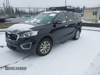 2018 Kia Sorento LX V6 with VIN 5XYPGDA58JG403974, listed as a IAAI auction lot 41233326 with 58,099 mi miles. Bid and sale history available at carsss.com. Image 2.