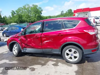 2016 Ford Escape SE z VIN 1FMCU9GX0GUB51525, wystawiony jako IAAI lot #42237629 z przebiegiem 76 616 mil mil oraz . Historia ofert i sprzedaży dostępna na DreamBid. Obrazek 14.