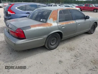1999 Mercury Grand Marquis GS z VIN 2MEFM74W4XX631219, wystawiony jako IAAI lot #42096304 z przebiegiem 267 738 mil mil oraz . Historia ofert i sprzedaży dostępna na DreamBid. Obrazek 4.