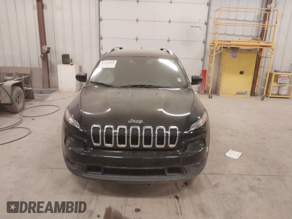 2015 Jeep Cherokee Latitude with VIN 1C4PJLCS8FW689849, listed as a IAAI auction lot 42144161 with 138,740 mi miles and . Bid and sale history available at carsss.com. Image 12.