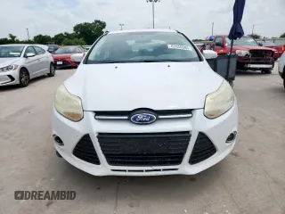 2013 Ford Focus SE with VIN 1FADP3F20DL289978, listed as a Copart auction lot 63350585 with 211,677 mi miles and Salvage title. Bid and sale history available at DreamBid. Image 5.