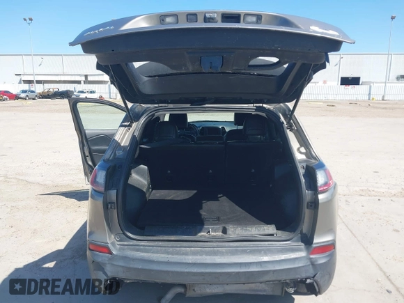 2019 Jeep Cherokee Latitude Plus with VIN 1C4PJMLBXKD233749, listed as a IAAI auction lot 41937698 with 103,988 mi miles and . Bid and sale history available at DreamBid. Image 18.