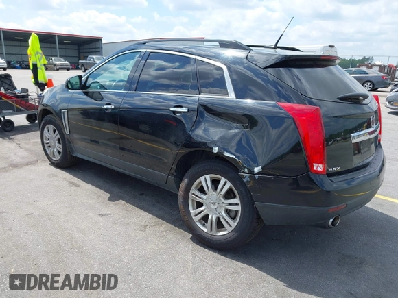 2014 Cadillac SRX with VIN 3GYFNAE30ES641616, listed as a IAAI auction lot 42000120 with 145,000 mi miles and . Bid and sale history available at DreamBid. Image 3.