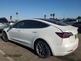 2020 Tesla Model 3 Standard Range Plus z VIN 5YJ3E1EAXLF644911, wystawiony jako Copart lot #52390785 z przebiegiem 138 783 mil mil oraz Szkoda całkowita • Salvage title. Historia ofert i sprzedaży dostępna na DreamBid. Obrazek 2.