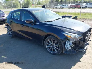 2018 Mazda 3 Touring z VIN 3MZBN1L39JM183867, wystawiony jako IAAI lot #42079963 z przebiegiem 91 829 mil mil oraz . Historia ofert i sprzedaży dostępna na DreamBid. Obrazek 1.