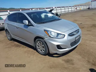 2014 Hyundai Accent GS with VIN KMHCT5AEXEU182880, listed as a IAAI auction lot 42215681 with 146,759 mi miles. Bid and sale history available at carsss.com. Image 1.