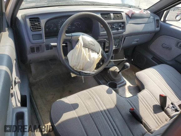 1998 Nissan Frontier XE with VIN 1N6DD21S8WC386978, listed as a Copart auction lot 58776015 with Not provided miles and Clean title. Bid and sale history available at DreamBid. Image 8.