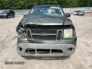 2003 Ford Explorer Sport XLS z VIN 1FMYU60E03UC12105, wystawiony jako Copart lot #67044604 z przebiegiem 277 642 mil mil oraz Szkody całkowita. Historia ofert i sprzedaży dostępna na DreamBid. Obrazek 5.