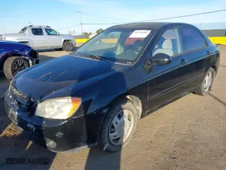 2004 Kia Spectra LX with VIN KNAFE122745033048, listed as a IAAI auction lot 41234181 with 157,410 mi miles. Bid and sale history available at carsss.com. Image 2.