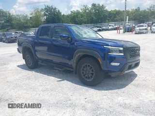 2022 Nissan Frontier Pro-4X z VIN 1N6ED1EK3NN634775, wystawiony jako IAAI lot #42789790 z przebiegiem 25 453 mil mil oraz . Historia ofert i sprzedaży dostępna na DreamBid. Obrazek 1.