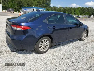 2023 Toyota Corolla LE with VIN 5YFB4MDE0PP051699, listed as a Copart auction lot 53589734 with 21,080 mi miles and Salvage Title. Bid and sale history available at carsss.com. Image 3.