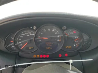 2002 Porsche 911 z VIN WP0AA29982S620729, wystawiony jako Copart lot #56653095 z przebiegiem 83 865 mil mil oraz Szkoda całkowita • Salvage title. Historia ofert i sprzedaży dostępna na DreamBid. Obrazek 9.