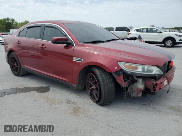 2015 Ford Taurus SEL with VIN 1FAHP2E87FG187946, listed as a Copart auction lot 53481575 with 119,746 mi miles and Salvage Title. Bid and sale history available at carsss.com. Image 4.