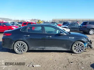 2019 Kia Optima S with VIN 5XXGT4L31KG355781, listed as a IAAI auction lot 41833796 with 130,804 mi miles. Bid and sale history available at carsss.com. Image 14.