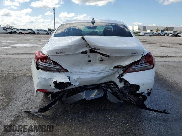 2021 Genesis G70 3.3T with VIN KMTG74LE8MU072654, listed as a Copart auction lot 74278574 with 27,323 mi miles and Non Repairable. Bid and sale history available at carsss.com. Image 6.