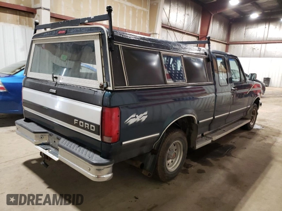 1994 Ford F-150 with VIN 1FTEX14N5RKB15059, listed as a Copart auction lot 71098704 with 165,273 mi miles and Clean Title. Bid and sale history available at carsss.com. Image 3.