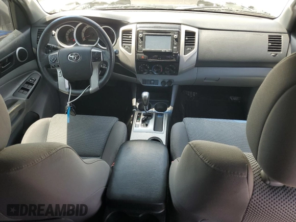 2014 Toyota Tacoma PreRunner with VIN 3TMKU4HN8EM041212, listed as a Copart auction lot 61948125 with 83,601 mi miles and Salvage title. Bid and sale history available at DreamBid. Image 8.