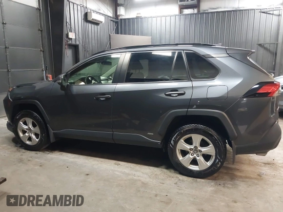 2019 Toyota RAV4 Hybrid LE with VIN JTMMWRFV8KD036053, listed as a IAAI auction lot 42502103 with 94,113 mi miles and . Bid and sale history available at DreamBid. Image 14.